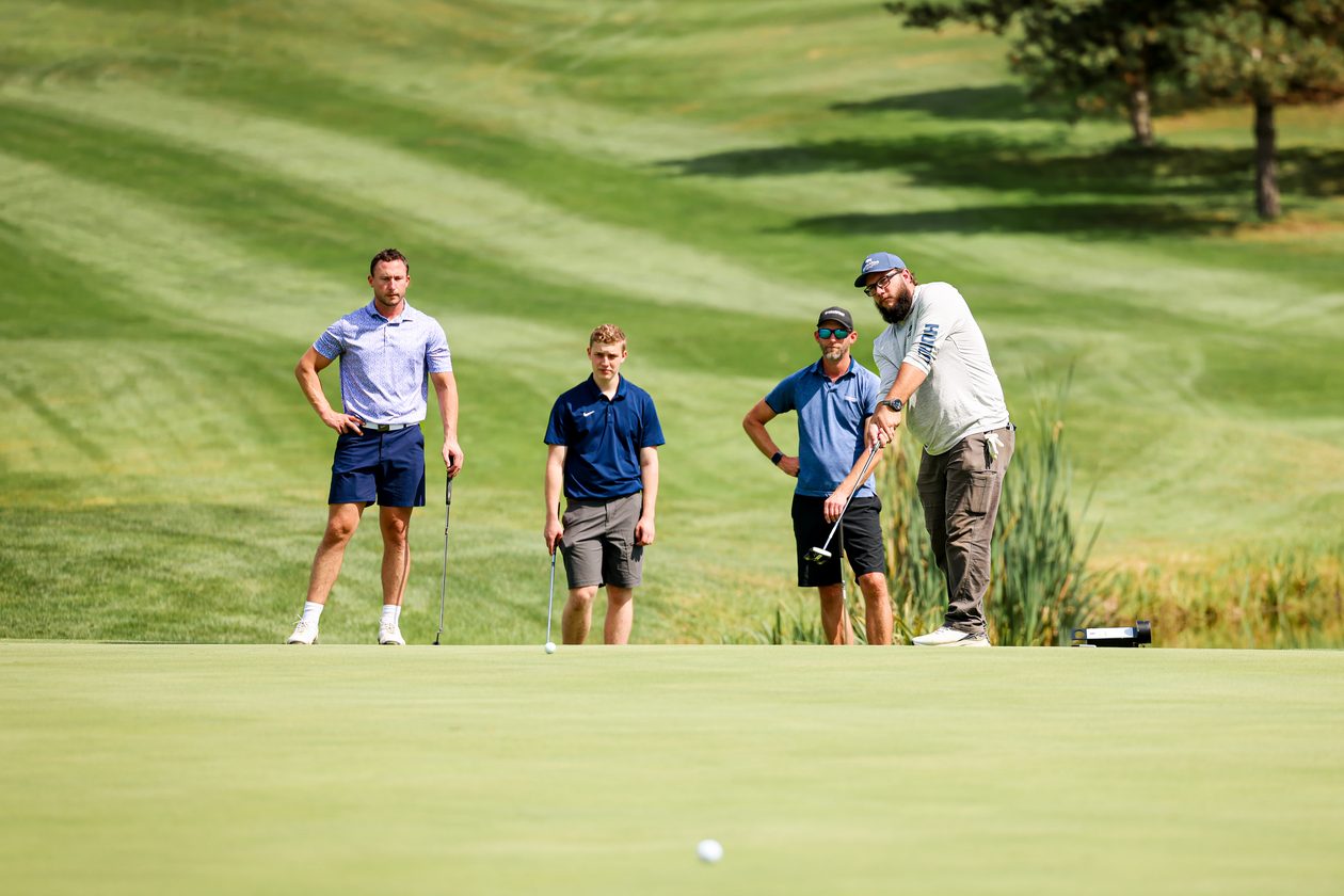 PTA staff on the putting green at the 2026 annual golf outing